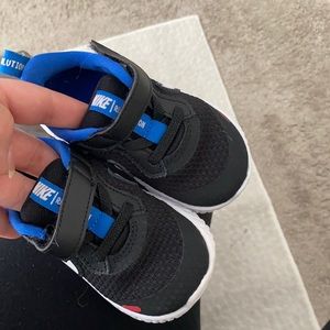 Red black and blue toddler nikes